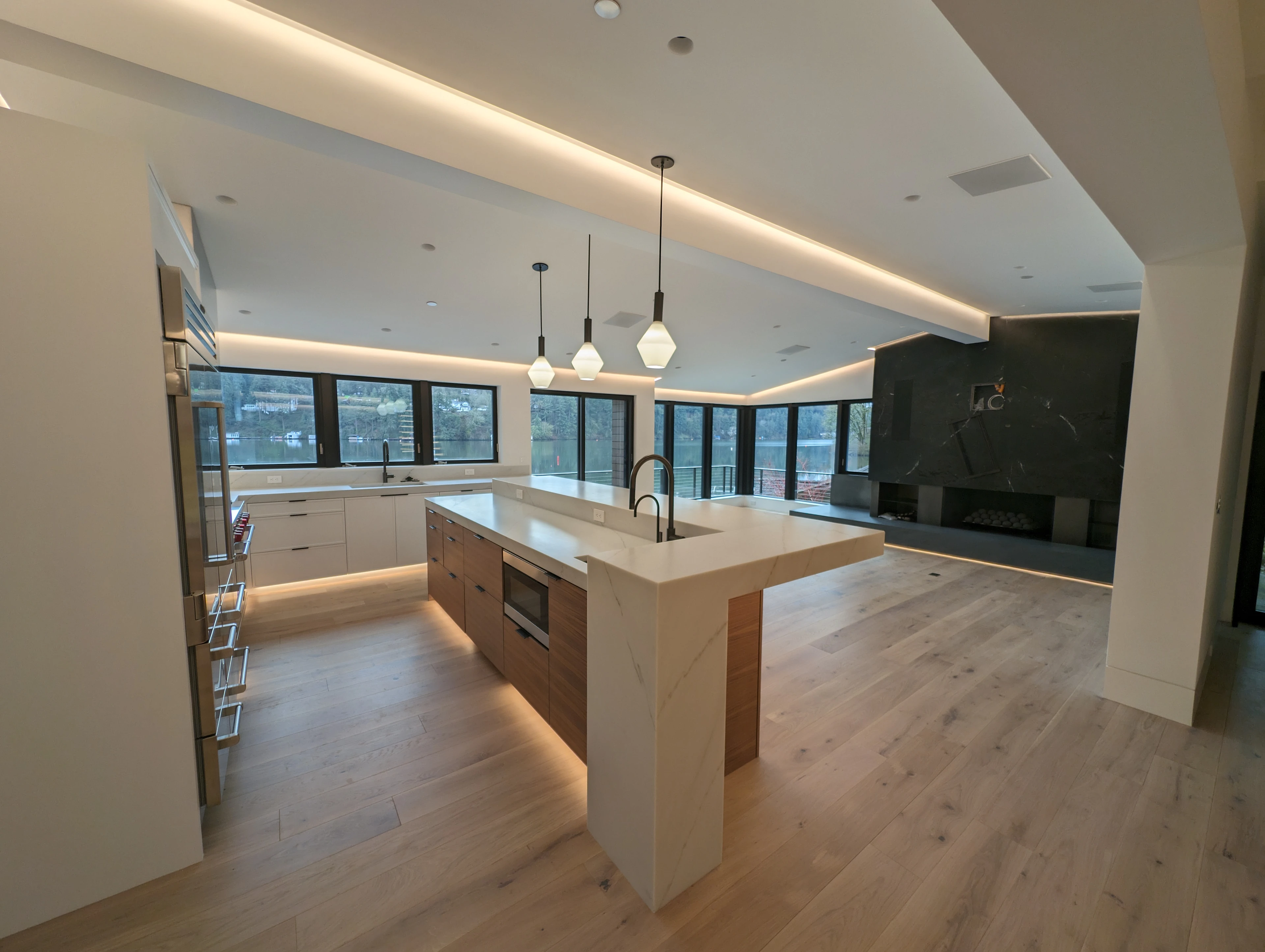 Lake-view kitchen lighting installation