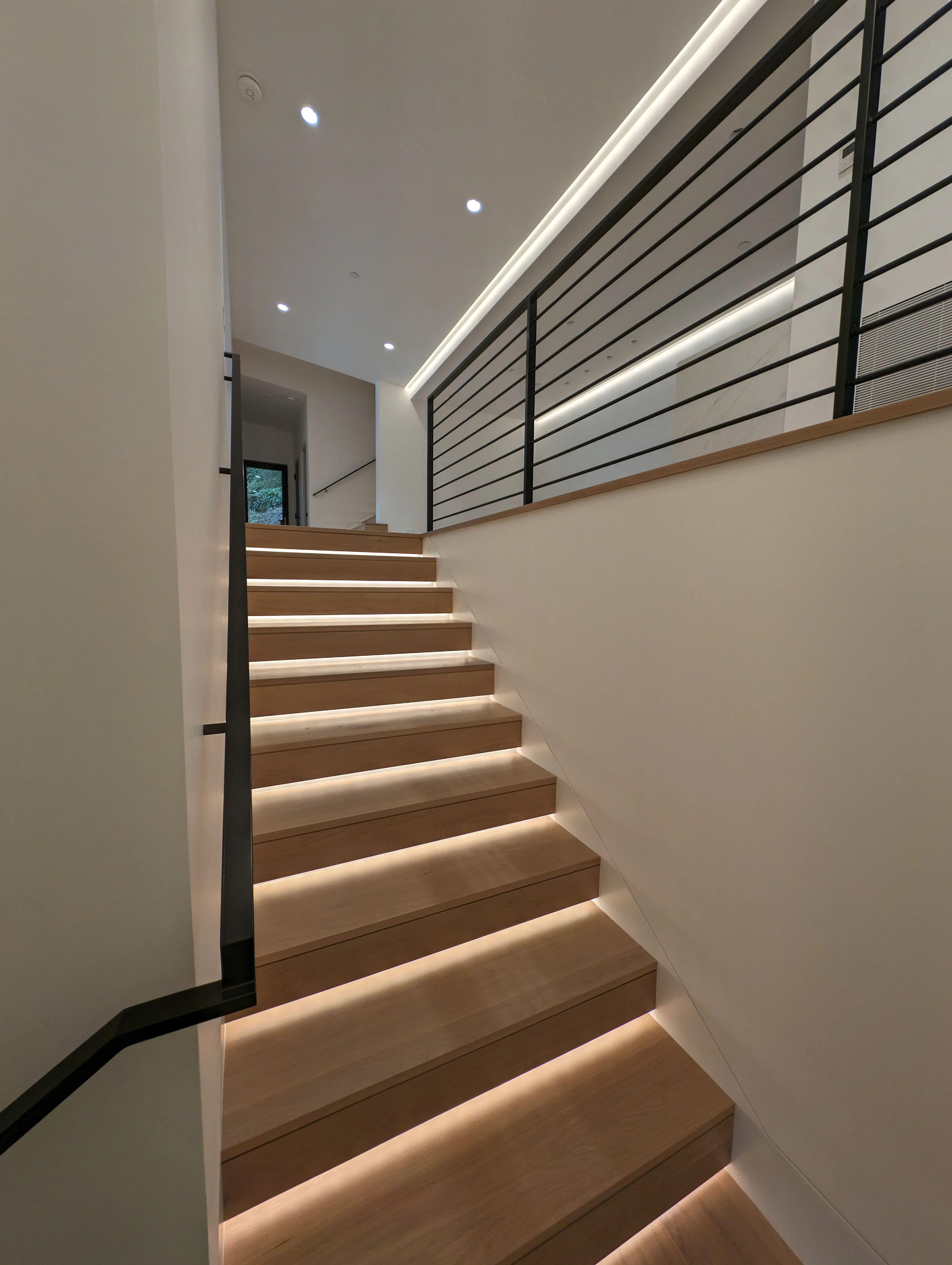 Integrated staircase tread lighting